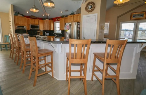 Colington Casa | Wake up to an Outer Banks sunrise from this luxurious oceanfront home