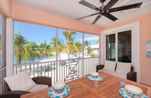 Rum Point Apartamento | Starfish Kai - Serene Beachfront Condo with Stunning Bay Views & Resort Amenities