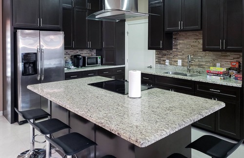 Brownsville Casa | Stately retreat with backyard oasis - pool, inviting patio - plus modern kitchen