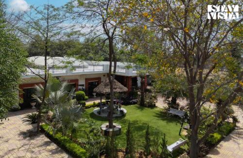 Sohna Villa | StayVista at Leela Retreat with BBQ, Bonfire, Pool & Lawn