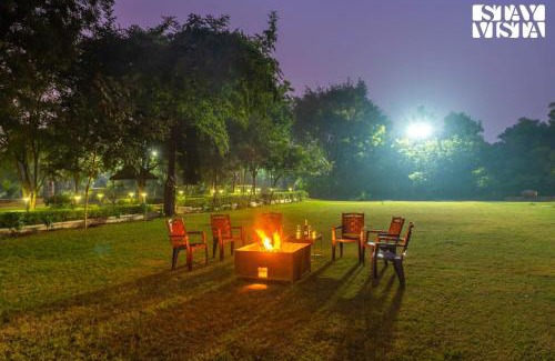 Sohna Villa | StayVista at Leela Retreat with BBQ, Bonfire, Pool & Lawn