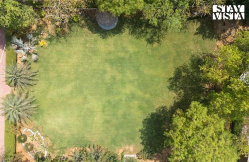 Sohna Villa | StayVista at Leela Retreat with BBQ, Bonfire, Pool & Lawn