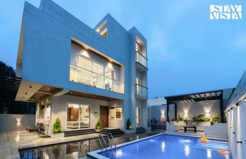 Khodala Villa | StayVista at Oriana Palms with Wifi and Pool