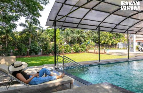 Kune Village Villa | StayVista's Greystone Estate with Pool, Terrace, and Snooker Table