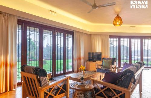 Vada Villa | StayVista's Waterway Retreat - Lakeside Oasis with Infinity Pool