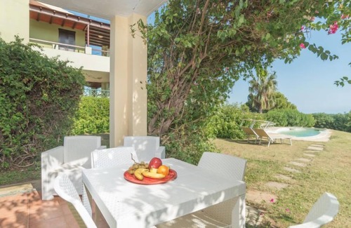 Costa Rei Apartamento | Stella con piscina comune (REI100) by Interhome