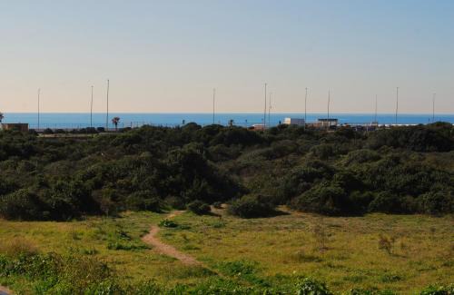 Quartiere XXXV Lido di Castel Fusano Apartamento | Stella Di Mare - ampio appartamento con DUE bagni - fronte mare