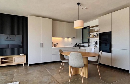 Mellieħa Heights Apartamento | Step inside to discover a modern and elegantly decorated space, featuring two spacious bedrooms with ample storage, ensuring a restful and convenient stay. The open-plan living area boasts contemporary furnishings, providing a chic and cozy atmospher