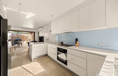 Palm Beach Casa | Steps from Sand: 2-Bed Beach Escape with Courtyard