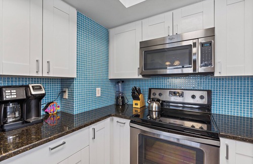 Holmes Beach Villa | Casa Coconut AMI # 1, 2 BR, 1 baño al otro lado de la calle de Manatee Beach.