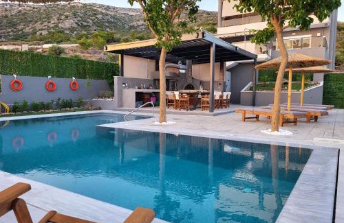 Saronida Casa | Stergiou Luxury Apartments με κοινη πισινα