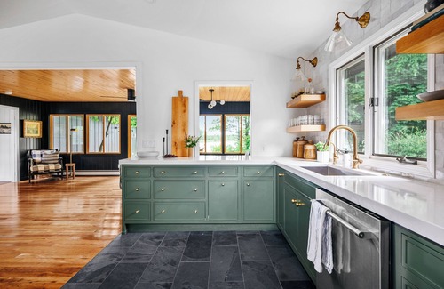 Omena Cabaña | Stillwater Cottage - lakefront with chefs kitchen, fireplace, firepit
