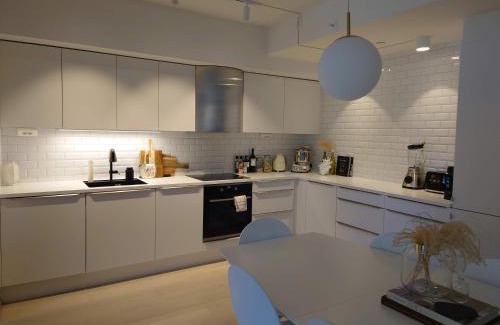 Trondheim Apartamento | Stilren leilighet midt på Lade
