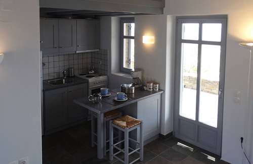 Chrissi Akti Casa | StoneHouse junto a la piscina