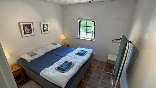 Hollviken Apartamento | Stort rymligt boende med två sovrum och pentry i lantlig miljö