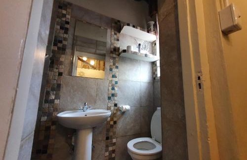 Strand Apartamento | Strand Family studio en-suite 6 sleeper Kitchenette Helderberg CT