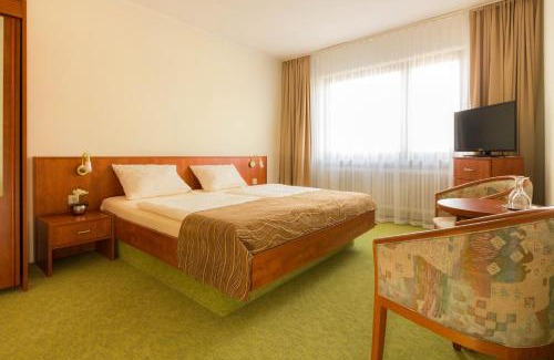 Tossens Hotel | Strand Hotel Nordsee, Hotel Deichläufer