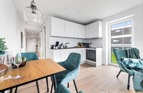 Olpenitz Apartamento | Strandfeder – Moderne Ostsee-Ferienwohnung für Drei im OstseeResort Olpenitz