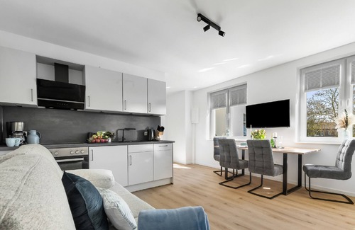 Gelting Apartamento | Strandleben - upper floor, bathroom with shower, TV, parking space, terrace, barbecue, garden furniture,
