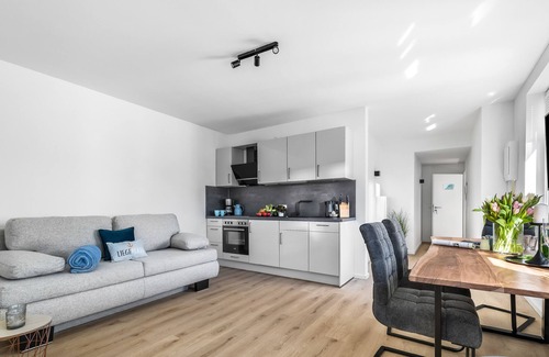Gelting Apartamento | Strandleben - upper floor, bathroom with shower, TV, parking space, terrace, barbecue, garden furniture,