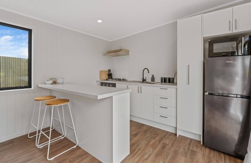 Waitahanui Casa | Streamside Flax Cabin
