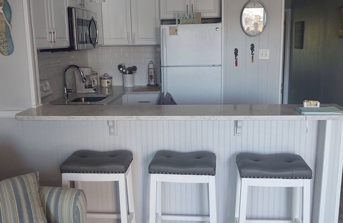 Caine Woods Condominio | Familia 1bedroom amigable / 1bathwalk a la playa. Wifi gratuito Dos grandes de la piscina.