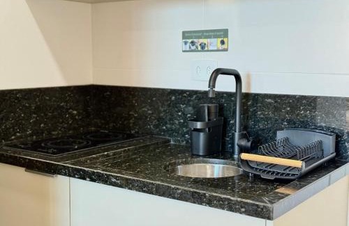 Matriz Apartamento | Studio a 500 metros do Mercado Municipal com Pisicina, academia e coworking