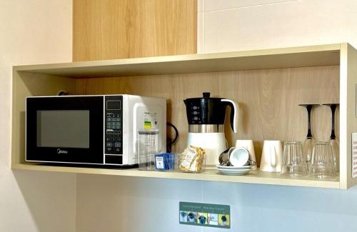 Matriz Apartamento | Studio a 500 metros do Mercado Municipal com Pisicina, academia e coworking