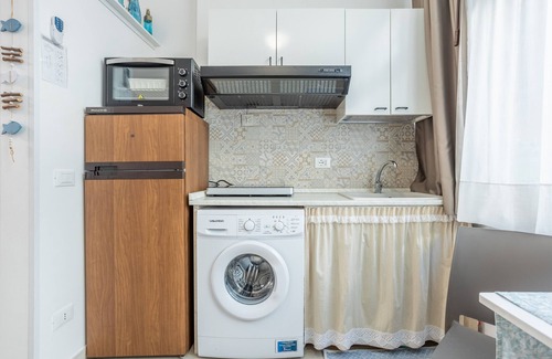Mondello Apartamento | Apartamento estudio 'Flat Blu Palermo Mondello' con piscina compartida, terraza y aire acondicionado