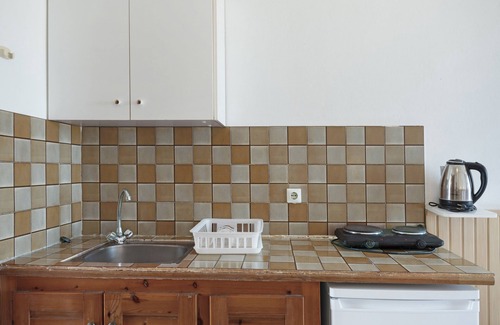 Tingaki Apartamento | Apartamento estudio 'Golden Sun 3' con vistas al mar, piscina compartida y Wi-Fi