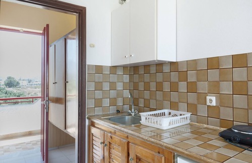 Tingaki Apartamento | Apartamento estudio 'Golden Sun 3' con vistas al mar, piscina compartida y Wi-Fi