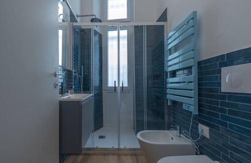 San Donato - Campidoglio Apartamento | Studio apartment with double bed, armchair bed and equipped kitchenette.