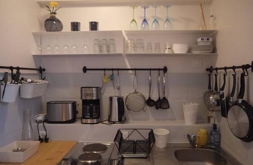 Arzon Apartamento | estudio para 4 personas con acceso para discapacitados y jardín compartido