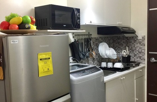 Phil-Am Apartamento | ESTUDIO cerca de MALLS y MRT STATION con WiFi y NETFLIX