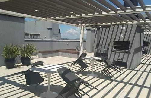 Simoes Lopes Apartamento | Studio Xavante - com garagem, portaria 24h e uma vista linda!