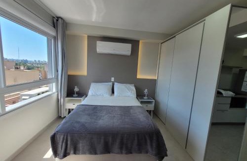 Partenon Apartamento | StudioLUX, Vaga Grátis, Piscina, Gym, NetFlix, ao lado da PUC