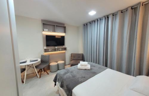 Partenon Apartamento | StudioLUX, Vaga Grátis, Piscina, Gym, NetFlix, ao lado da PUC