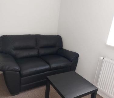Odense Apartamento | Stuelejlighed med have og overdækket terrasse