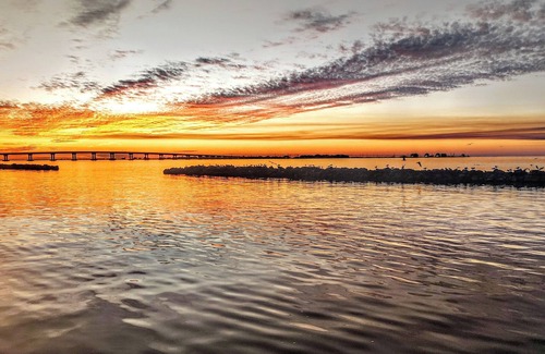 Grand Isle Condominio | Stunning 2 bed 2 bath condo with wrap around balcony overlooking the marina.