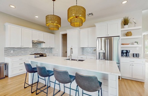 Rockport Casa | Stunning canal front home with private pool, fire pit, and boat dock