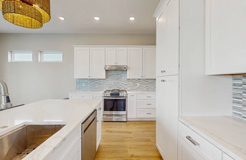 Rockport Casa | Stunning canal front home with private pool, fire pit, and boat dock