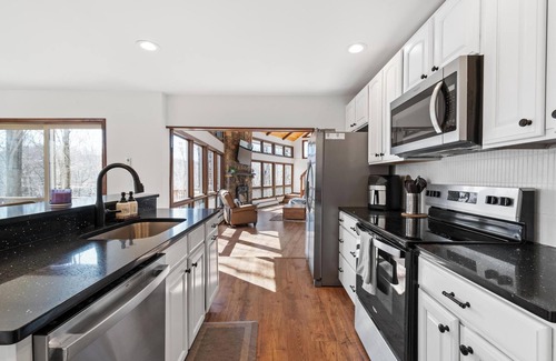 Gouldsboro Casa | Stunning House on River with Hot Tub and Game Room in Big Bass Lake w/Amenities!