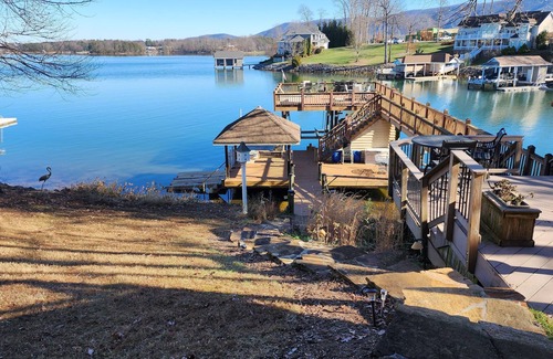 Penhook Casa | Stunning lake front with private dock and pontoon boat available for rent