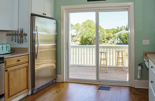 Oceanmarsh Subdivision Casa | Stunning Marsh Views, 2 Golf Carts Included, 2 Master Suites, expansive decks with ocean breeze
