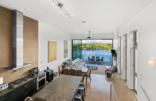 Lihue Apartamento | Stunning Oceanfront Penthouse, 14' ft Ceilings and Wall-to-Wall Glass Slider.
