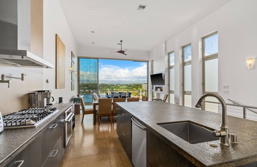 Lihue Apartamento | Stunning Oceanfront Penthouse, 14' ft Ceilings and Wall-to-Wall Glass Slider.