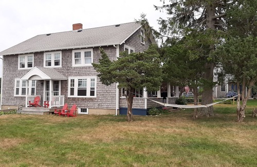 Pocasset Casa | Stunning sunsets overlooking Buzzards Bay