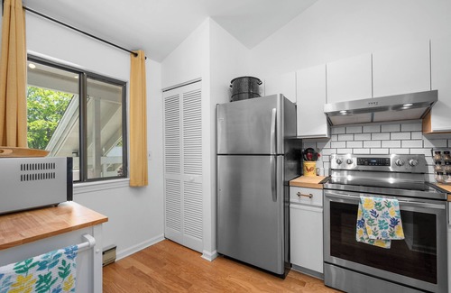 Brewster Condominio | Stylish and Modern Upper Level End Unit Condo at OCEAN EDGE