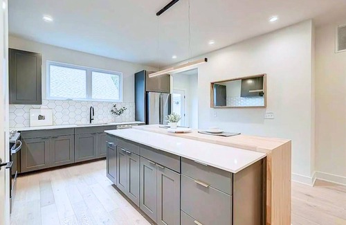 Fall Creek Place Casa | Stylish Oasis: 4BR, Hot Tub, Near Downtown