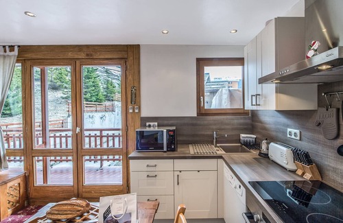 Courchevel Apartamento | Apartamento renovado con acceso directo a pistas en el centro de Courchevel